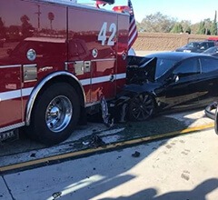 A Tesla Driver Experiences Non-Life-threatening Injuries After An Accident With An Ambulance And A Safety Cruiser