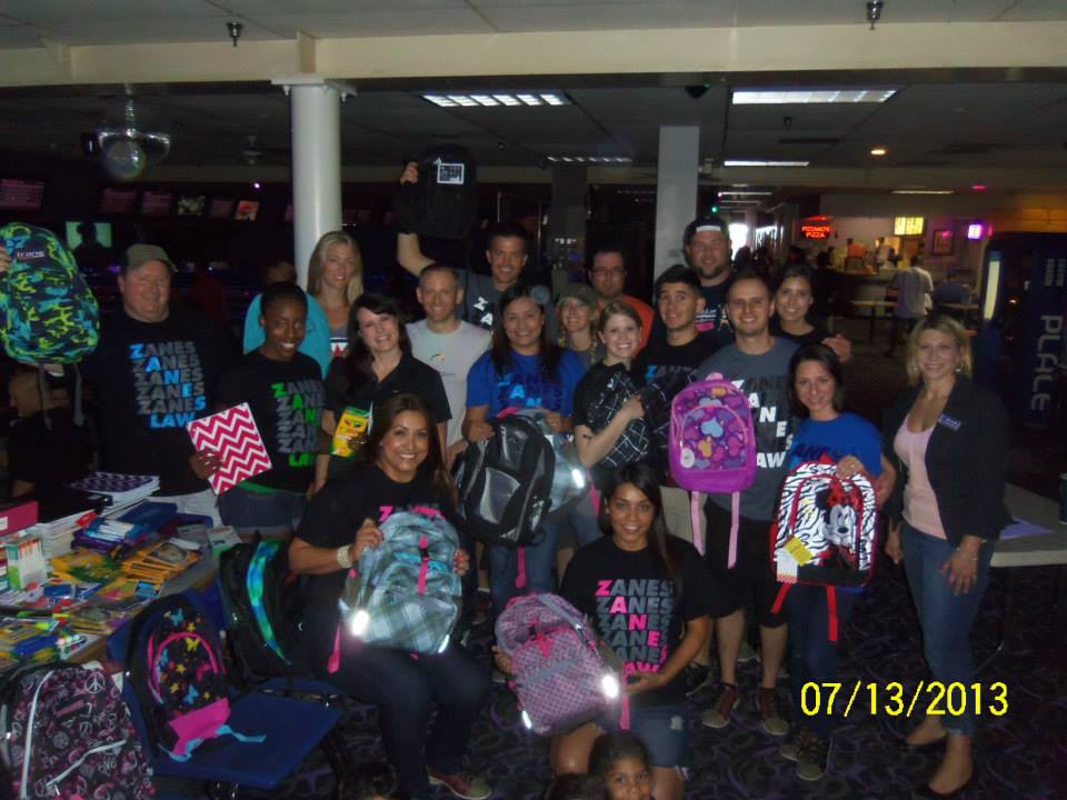 Zanes Law Helps Tucson Young Professionals with a Successful Bowling for Backpacks Event